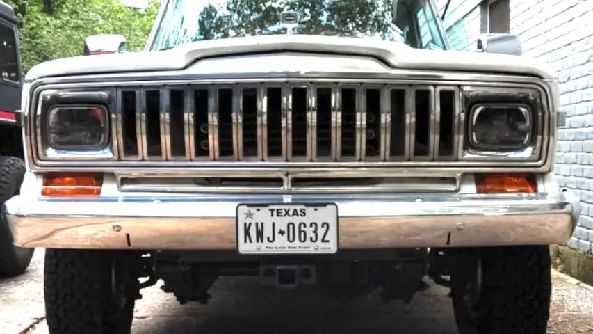 Jeep Wagoneer with refinished grill and bumper. Lots of sanding, buffing, and polishing.