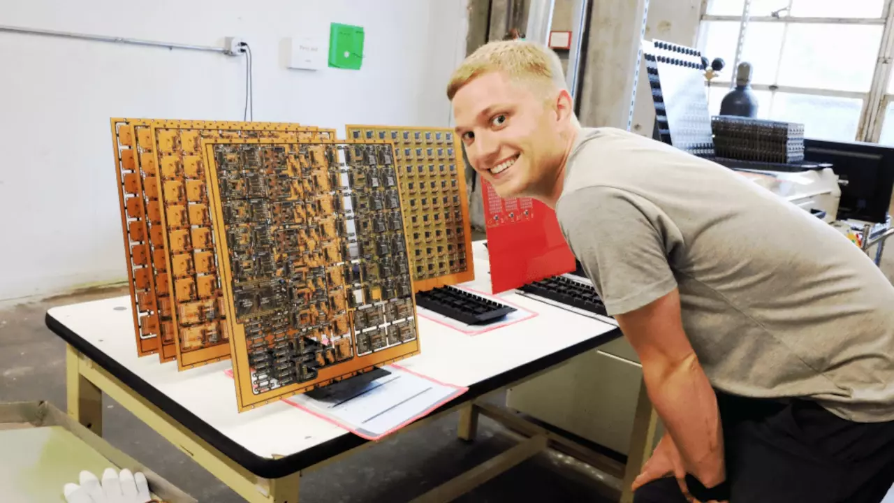 Figure 1: Scott Shawcroft of Chickadee Tech checking out the fresh “just out the reflow” panels.