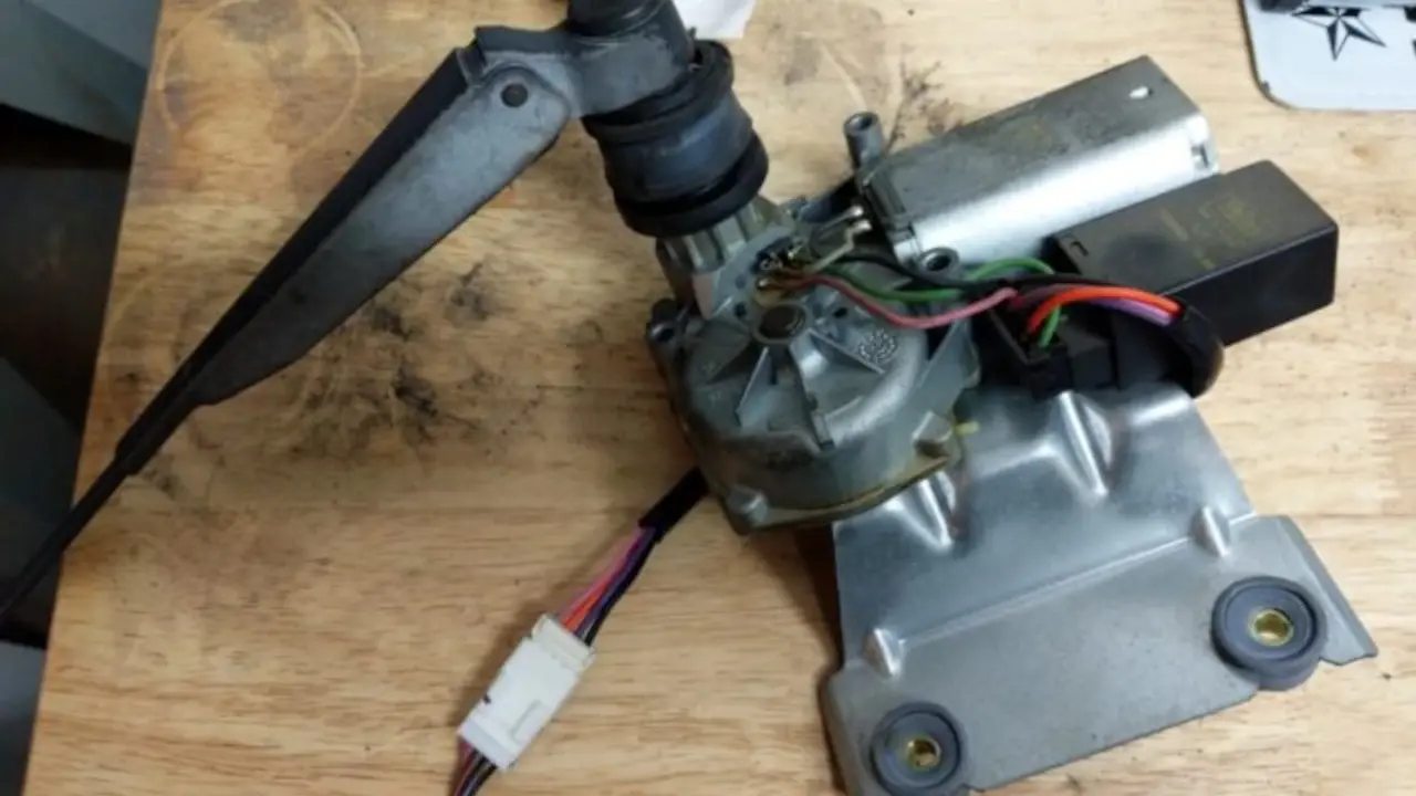 Wiper motor assembly from a 1999 Dodge Durango.